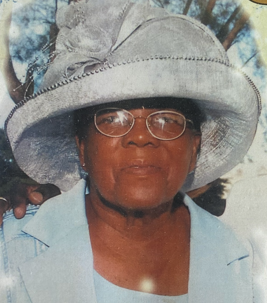 Portrait of Ethel Priscilla Cleare wearing a hat and glasses